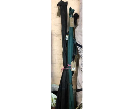 Nine fishing rods including a 7' Jarvis Walker 'Devil Stix' two section hollow fibreglass spinning fishing rod, an 8' Normark