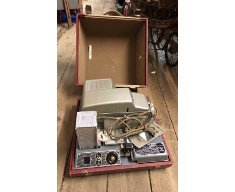 A vintage Aldis automatic 303 slide projector in original hard carry case