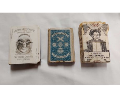 A bag containing a late 19th Century pack of Montana and Yellowstone souvenir playing cards by the Photo-Card-Co. of Butte Mo