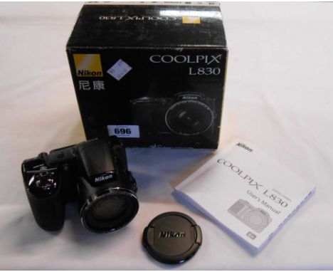 A Nikon Cool Pix L830 digital camera with instruction manual in original box