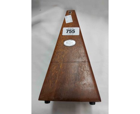 A wooden cased Maezel 'Paquet' metronome