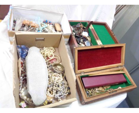 Two boxes and a decorative wooden box containing a large quantity of assorted costume jewellery - sold with another wooden bo