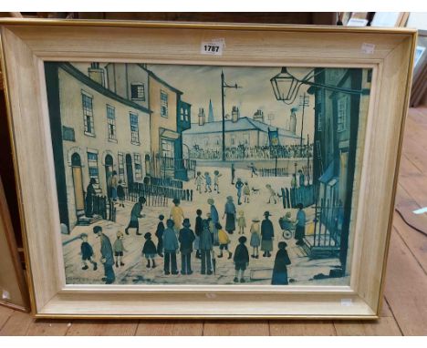 L.S. Lowry: a vintage framed coloured print on canvas entitled 'A Procession'