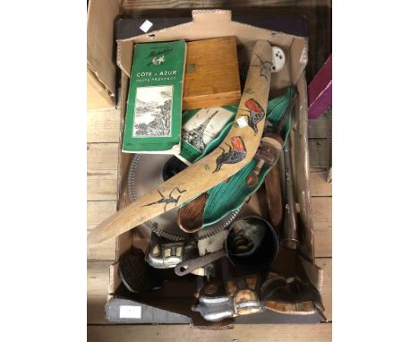 A box containing a quantity of collectable items including hunting horn, boomerang, cased drawing set, etc.