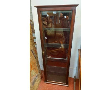 A 50cm 20th Century display cabinet with glass shelves enclosed by a glazed panel door