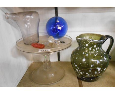 An 18th Century glass tazza with Silesian stem set on domed foot with folded base (a/f) and an early 19th Century 'Nailsea' g