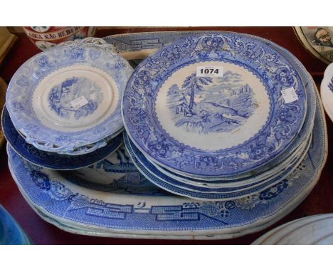 A quantity of willow pattern and other blue and white ceramics, including meat plates, plates, stands, etc.