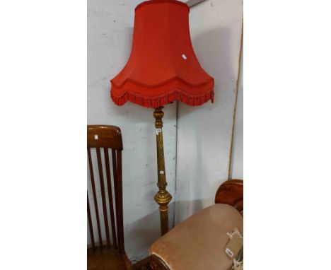 A 20th Century ornate giltwood torchere style standard lamp with shade