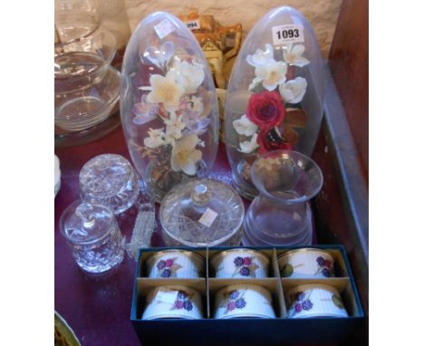 A small quantity of assorted glassware including glass domes set with flowers and butterflies, cut glass powder bowls, etc. -