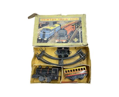 A Wells Brimtoy tinplate 0 gauge train set, with original box