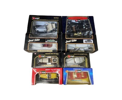 A collection of Boxed Bburago and Maisto die-cast car models.