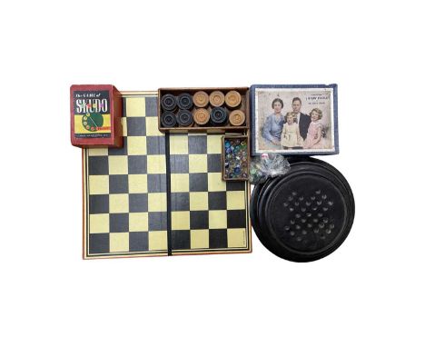 A mixed lot of vintage board games, to include: - 2 x Solitaire boards with glass marbles - Draughts board with turned wooden