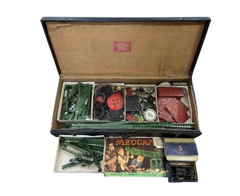 A large case containing a quantity of various vintage Meccano
