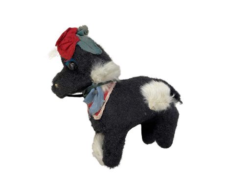 A vintage mechanical poodle, for repair