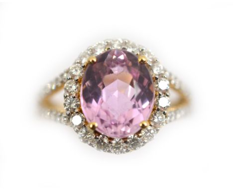 An Iliana 18ct H/M Brazilian kunzite &amp; diamond ring, with certificate, the single oval AAAA Brazilian kunzite approx 5.50
