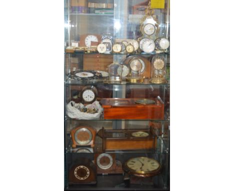 A watchmakers lifetime collection of watch parts, tools, cases, clocks, watches etc