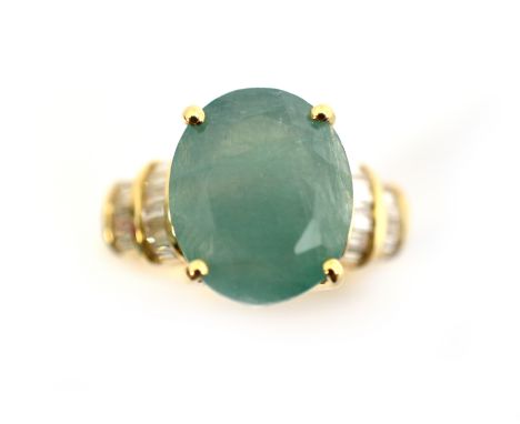 A 14ct H/M grandidierite &amp; diamond ring, the oval&nbsp;grandidierite weighs approx 5.25cts, the baguette cut diamonds tot