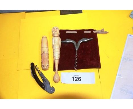 4 x assorted pieces comprising 1 x bone skull shaped cased corkscrew, 1 x dog shaped corkscrew, 1 x rosewood handle waiters f