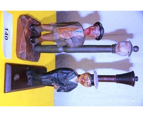 2 x 1950's male standing figure corkscrew/cap lifters, 270mm high