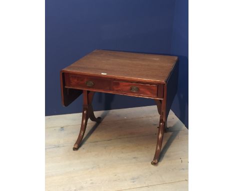 Edwardian mahogany sofa table, twin flap top above two short drawers on plain end supports and splayed legs (poor condition),