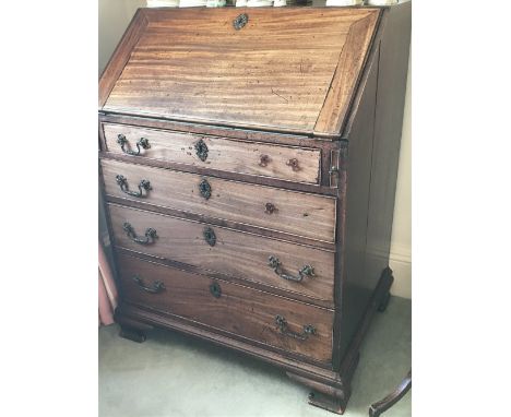 Mid-Georgian small mahogany rectangular bureau with sloping front and four graduated long drawers below on ogee bracket feet.