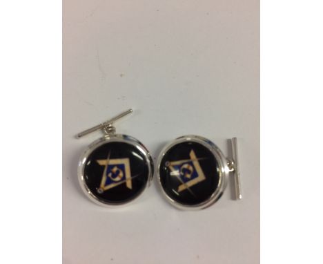 Pair of silver and enamel cufflinks with Masonic symbol