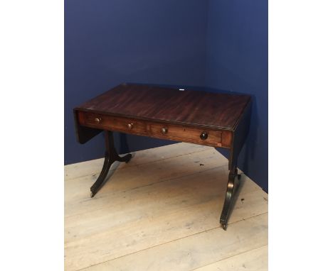 Victorian mahogany sofa table with rounded rectangular twin flap top and two frieze drawers, the obverse with false drawer fr