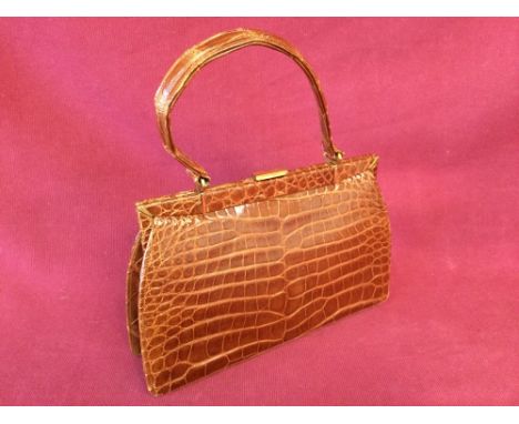 Light brown crocodile handbag with single handle