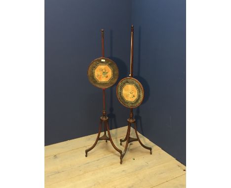 Pair of late C19th pole screens, each with floral printed panels on tripod legs, 187cmH