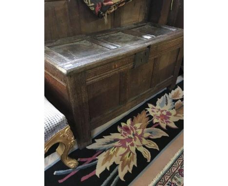 C18th triple panel oak coffer on stile supports, 119cmW