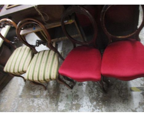 A group of three Victorian style chairs comprising a pair of Victorian mahogany chairs with carved backs, upholstered seats o