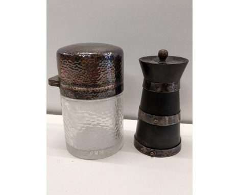 An early 20th century silver mounted pepper grinder of churn form, together with a silver topped dressing table jar Location: