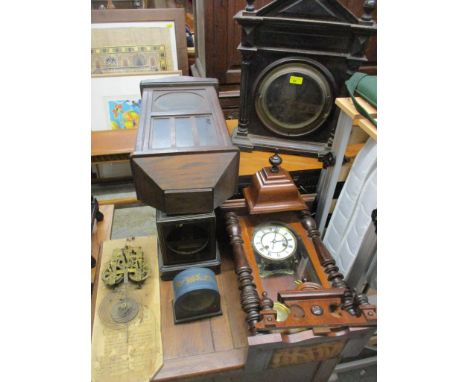 A mixed lot of late 19th/early 20th century clock cases and movements, for spares and repairs to include a Seth Thomas wall c