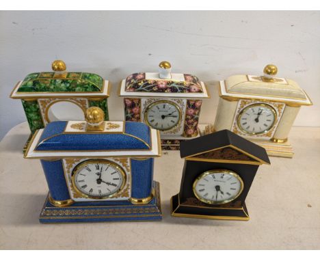 Five Wedgwood porcelain mantel clocks of architectural form, one missing movementLocation: 