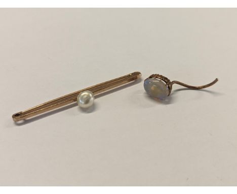 A 9ct gold bar brooch inset with a single pearl, together with a yellow metal earring inset with opal A/FLocation: cab 