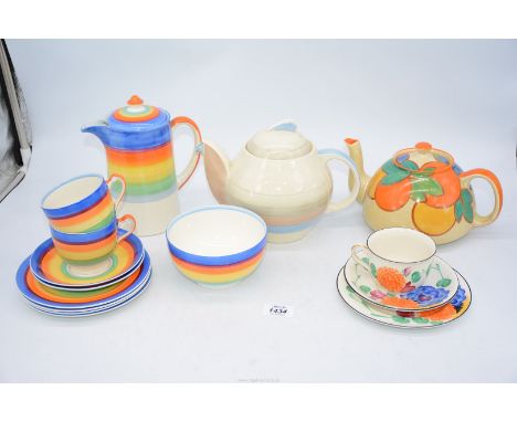 A 1929 Susie Cooper at Grays Elgreave shape Teapot with Hawaiian pattern, a 1930's Susie Cooper Kestrel shape Teapot and lid 