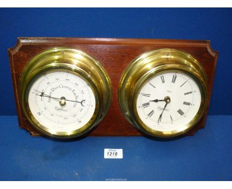 A "Captains" quartz clock and aneroid barometer set.