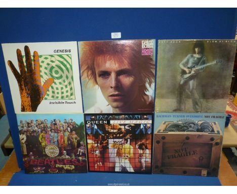 Six 1970's Rock Albums to include: Davie Bowie, Queen, The Beatles.