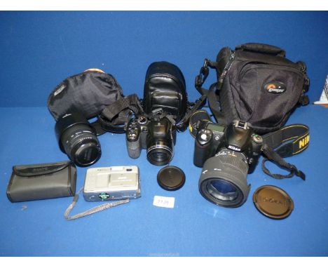 A Nikon D50 digital S/R camera with sigma DC 17-70mm f 2.8-4.5 lens and a Tamron AF 80-210mm f 4.5-5.6 lens, Fujifilm finepix
