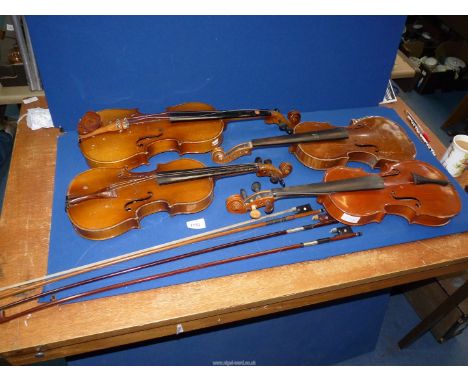 Four old violins (in need of attention) and three old violin bows (one by A. Zeller).