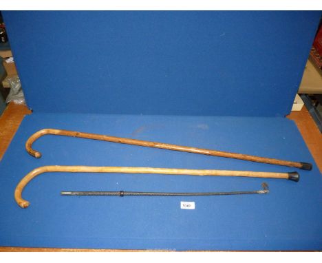 Two vintage walking sticks and a 19th century crop with silver plated top, (slight damage).