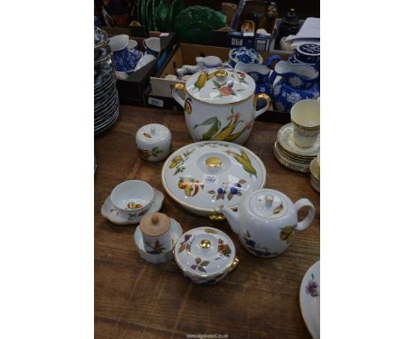A quantity of Royal Worcester "Evesham" to include: a large bean pot, teapot, "Parsley" herb pot, etc.