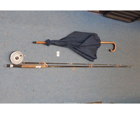 A Weobley & Scott Stream fly fishing rod and reel and a Vintage parasol/umbrella, with a patterned layer of fabric beneath th