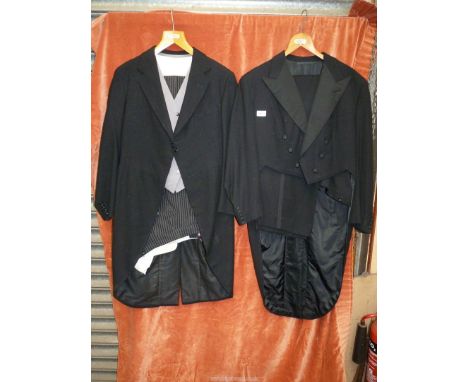 A gent's morning Suit with black jacket, grey waistcoat and striped trousers, plus a gent's Tails Suit with jacket and trouse