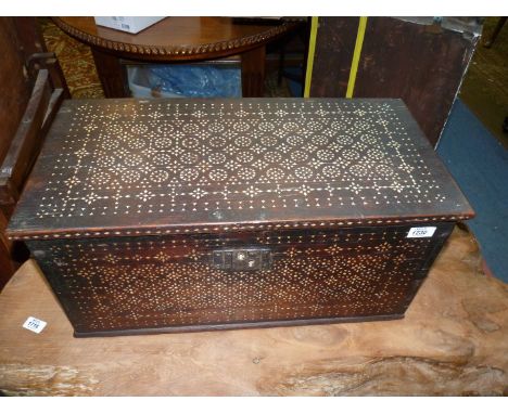 A compact Eastern dowry/storage Chest having a pair of carrying handles and all-over intricate mother of pearl inlaid decorat
