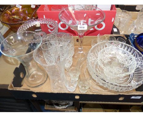 A quantity of glass to include: a fruit bowl, 10" diameter, four champagne glasses, eight sherry/port glasses, bon bon dishes