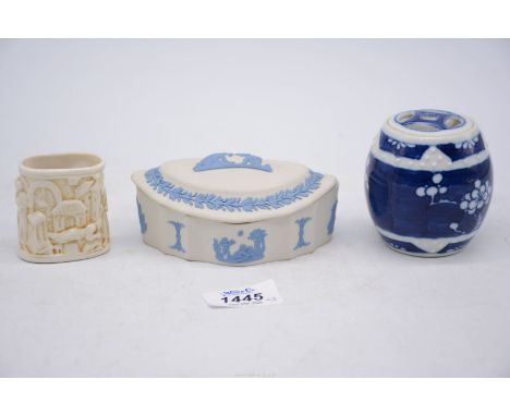 An unusual Chinese prunus barrel shape jar and lid with beading, 3" tall, and an English porcelain match holder striker with 