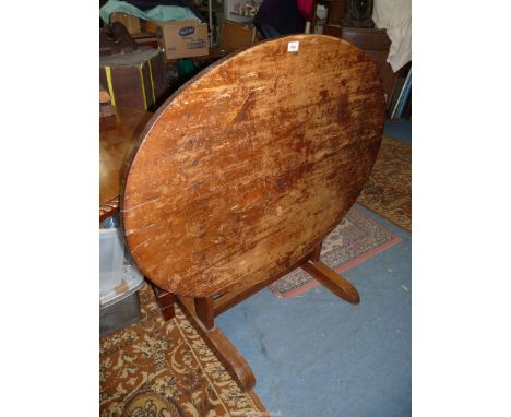 A French fruitwood wine tasting table (purchased from a vineyard), 43 3/4" wide x 32 1/2" deep x 43 5/8" high, the top 28 1/4