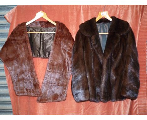 A ladies short evening fur Coat, size small (very good condition but no label) and a fur Stole in good condition, lined, tail