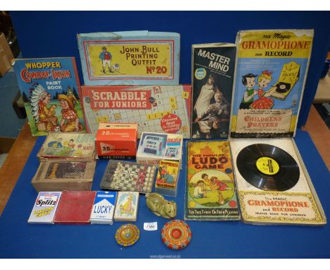 A quantity of vintage games to include: "The Magic Gramophone and record", a German tinplate rabbit, etc.
